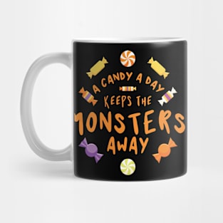 A candy a day keeps the monsters away - Halloween Mug